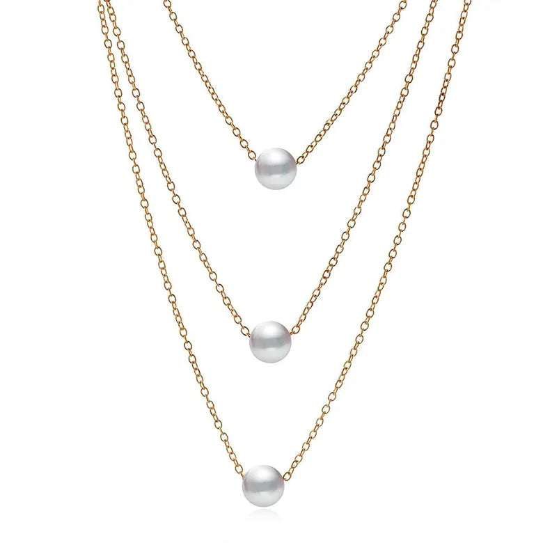 3 Pearl down gold necklace